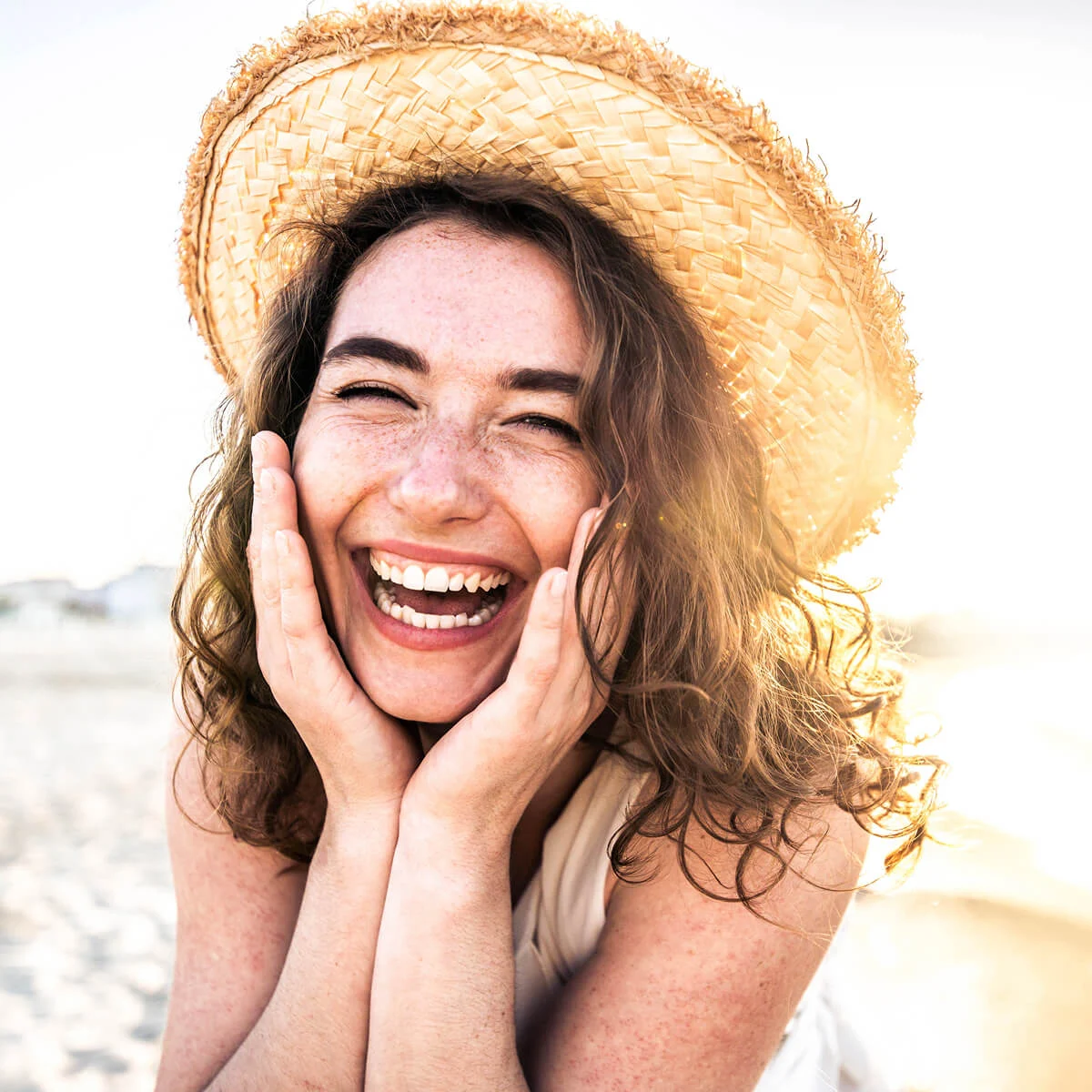 Smiling woman on beach