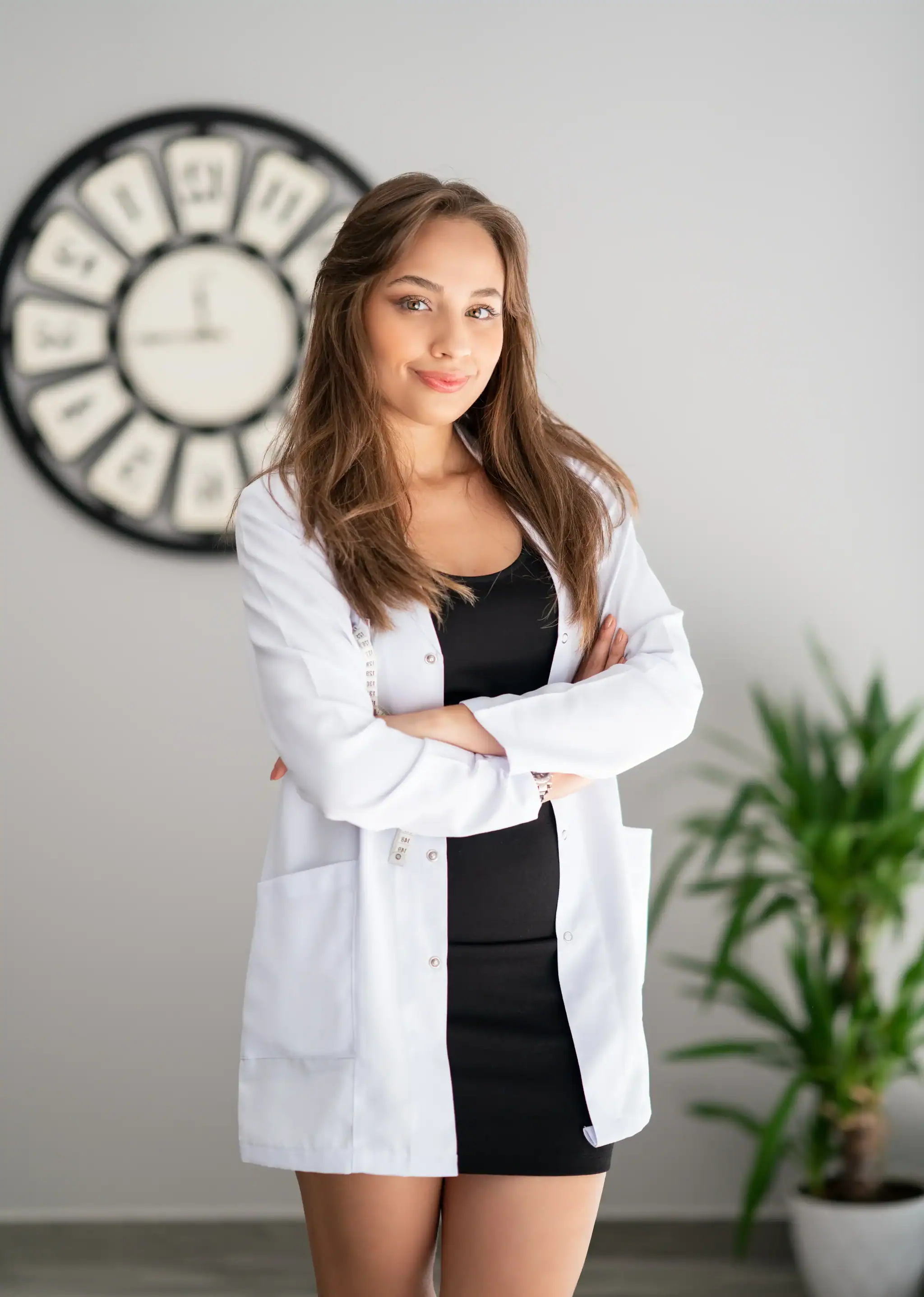 Clinician standing in a white coat at a mental health clinic