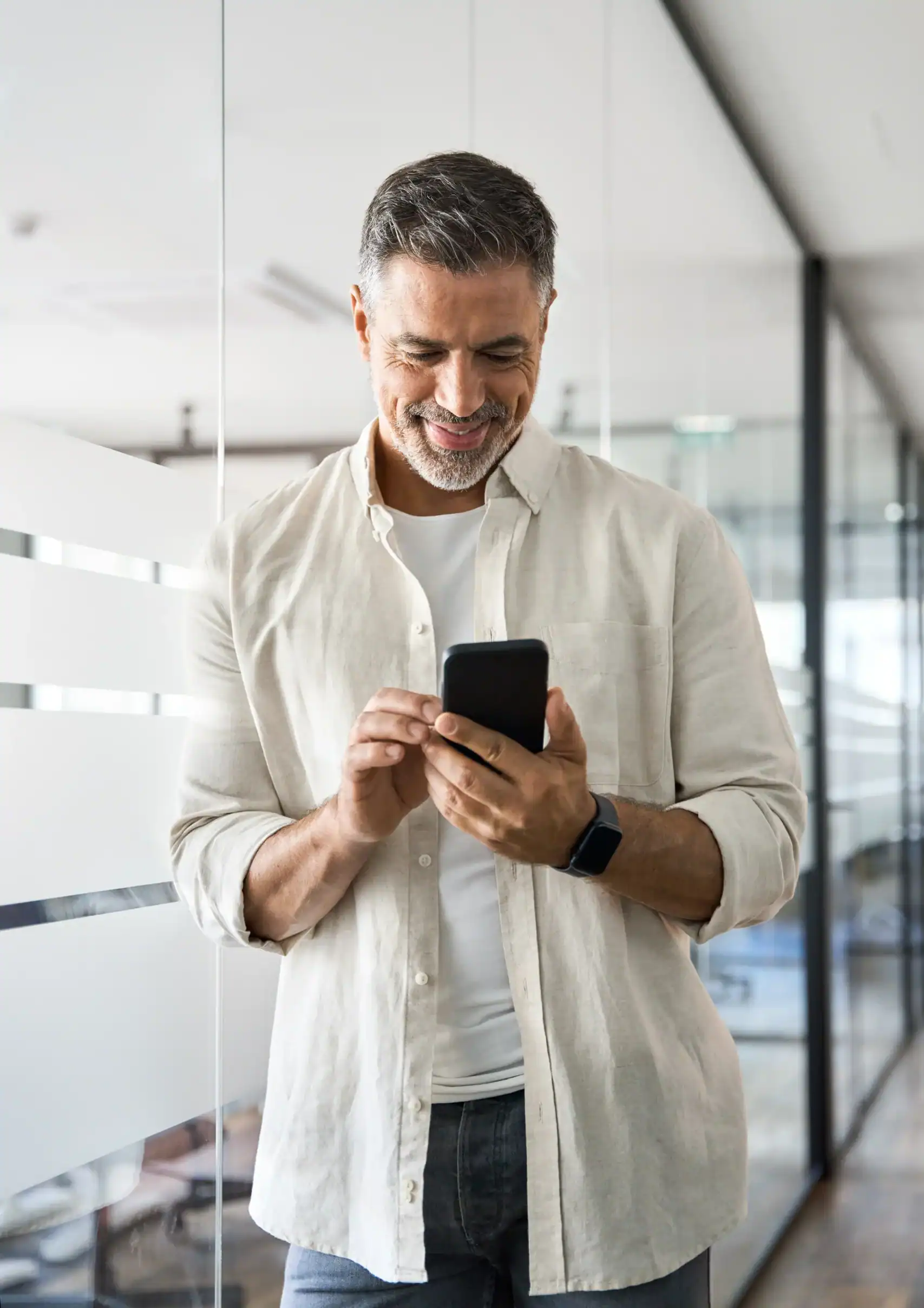 Man texting to schedule a mental health intake appointment