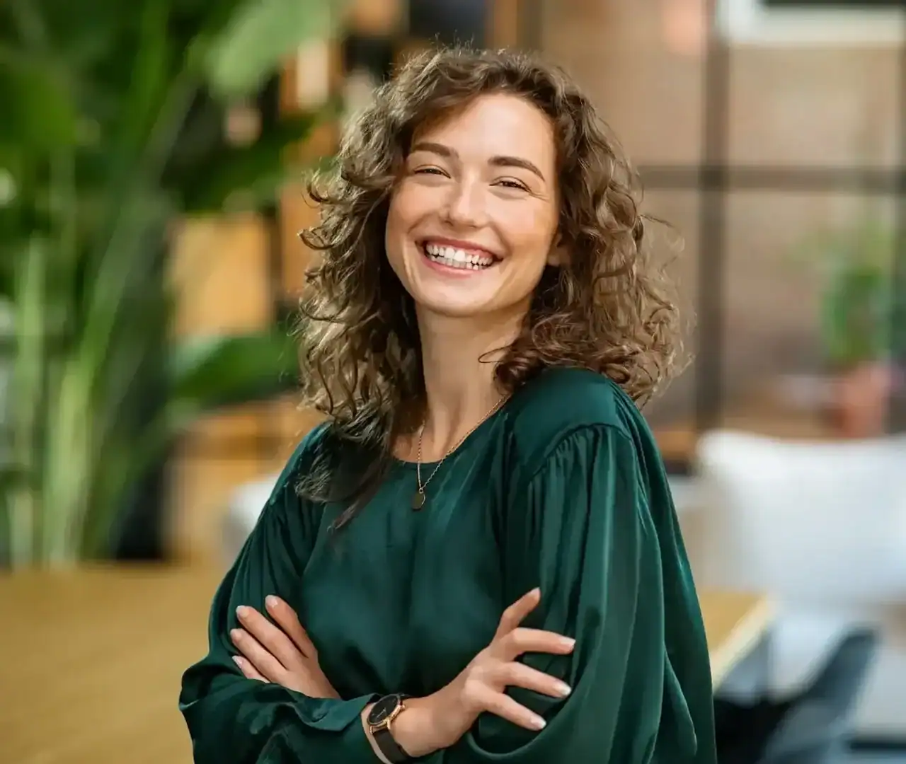 Smiling mental health therapist standing in an office setting