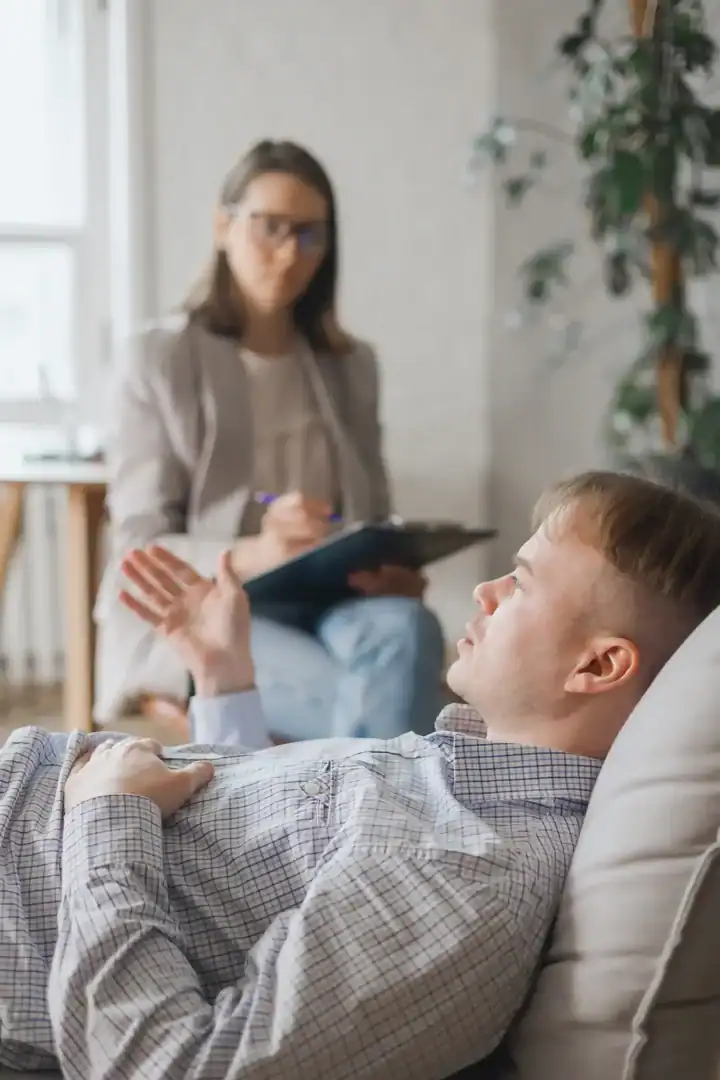 Client speaking during a therapy session