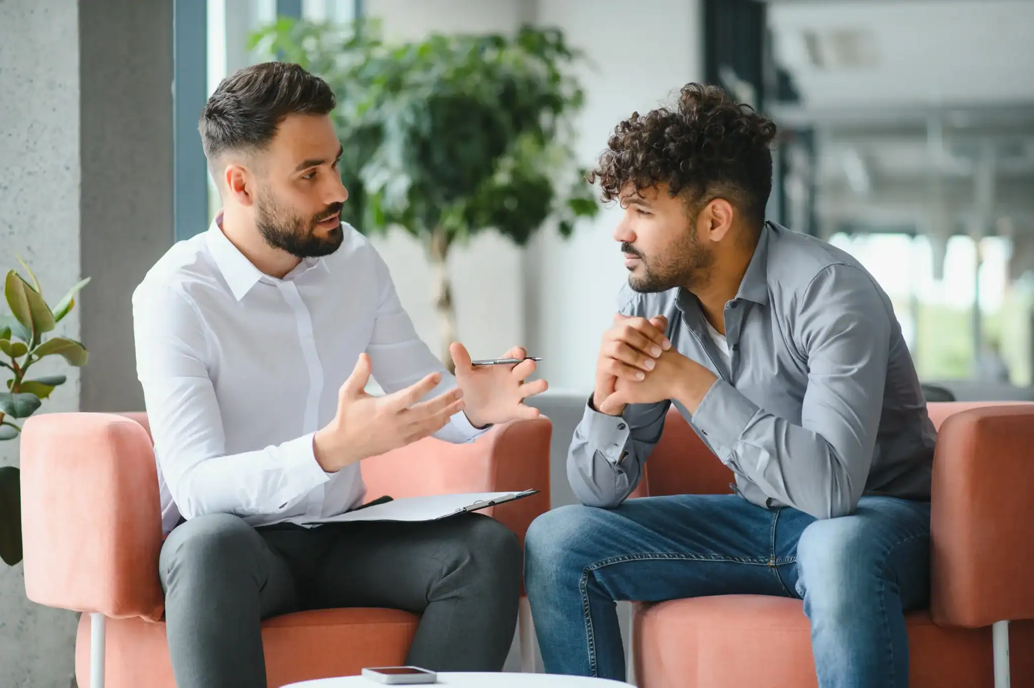 Therapist speaking with a client during a one-on-one depression treatment session