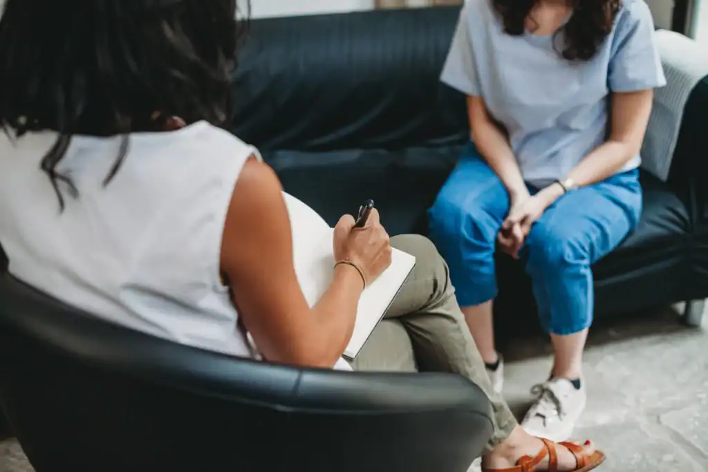 Therapist meeting with a client during an individual session for depression and co-occurring mental health concerns