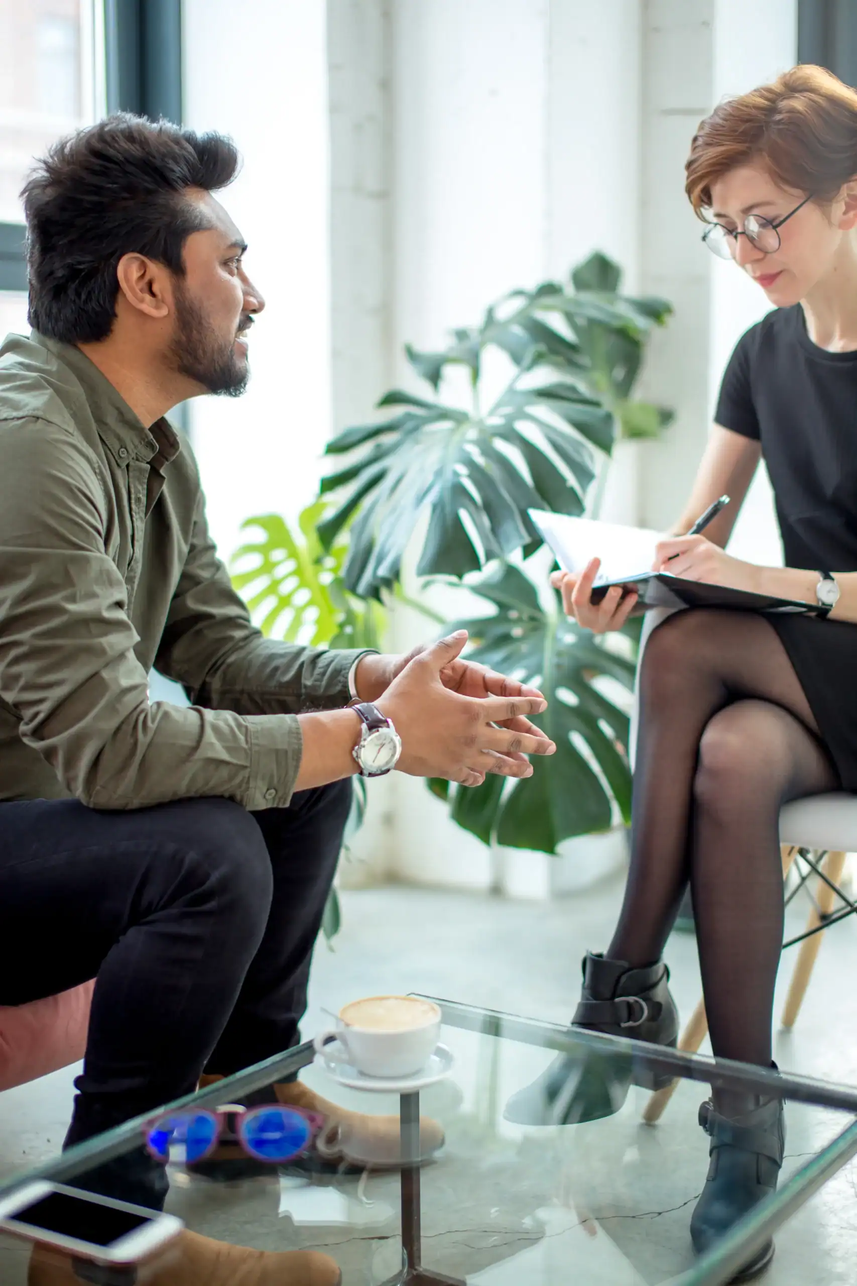 Client speaks with a clinician during a mental health diagnostic assessment.