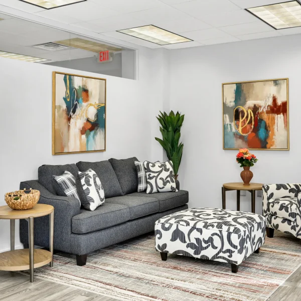 Cozy lounge at Wellness Hills with modern decor.