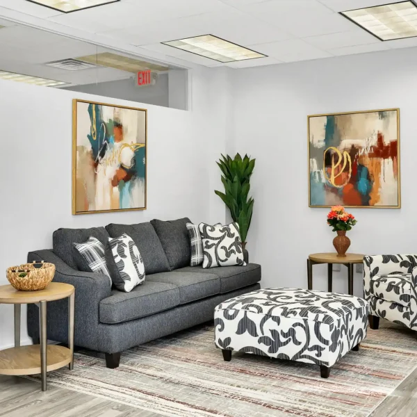 Cozy lounge at Wellness Hills with modern decor.